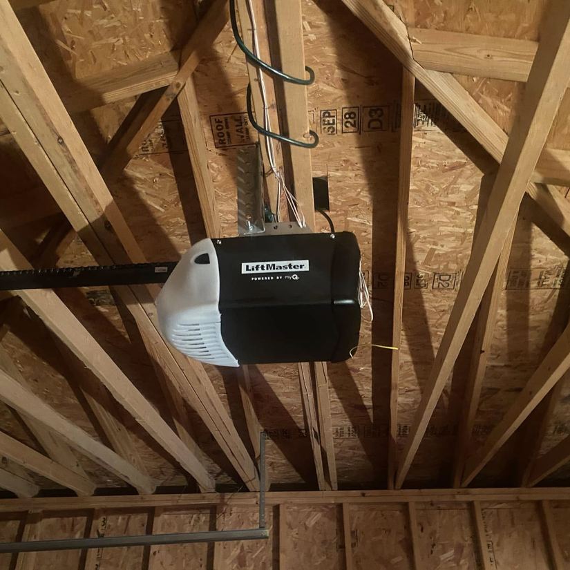 LiftMaster garage door opener mounted in rafters, Chicago